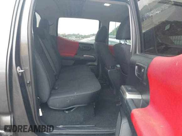 2017 Toyota Tacoma SR5 z VIN 3TMAZ5CN9HM044182, wystawiony jako IAAI lot #42116303 z przebiegiem 92 577 mil mil oraz . Historia ofert i sprzedaży dostępna na DreamBid. Obrazek 8.