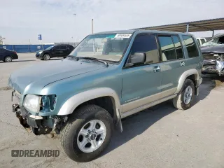 2002 Isuzu Trooper S z VIN JACDJ58X627J08662, wystawiony jako Copart lot #58969555 z przebiegiem 219 492 mil mil oraz Tytuł czysty. Historia ofert i sprzedaży dostępna na DreamBid. Obrazek 1.