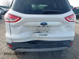 2014 Ford Escape SE with VIN 1FMCU0GX1EUB23743, listed as a IAAI auction lot 40893420 with 74,506 mi miles. Bid and sale history available at carsss.com. Image 6.