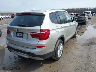 2017 BMW X3 xDrive28i with VIN 5UXWX9C55H0T12827, listed as a IAAI auction lot 41955621 with 101,127 mi miles. Bid and sale history available at carsss.com. Image 4.