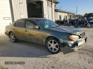 2002 Infiniti I35 Luxury with VIN JNKDA31A62T014458, listed as a Copart auction lot 77677764 with 169,007 mi miles and Salvage Title. Bid and sale history available at DreamBid. Image 4.