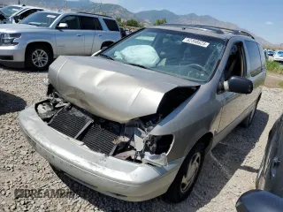 2000 Toyota Sienna LE with VIN 4T3ZF13C3YU292655, listed as a Copart auction lot 62398825 with 198,459 mi miles and Salvage title. Bid and sale history available at DreamBid. Image 1.