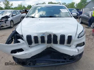 2015 Jeep Cherokee Latitude z VIN 1C4PJMCS3FW557734, wystawiony jako IAAI lot #42273937 z przebiegiem 168 828 mil mil oraz . Historia ofert i sprzedaży dostępna na DreamBid. Obrazek 12.