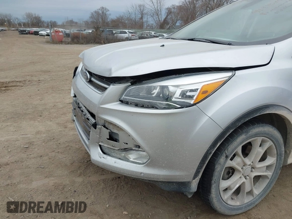 2015 Ford Escape Titanium with VIN 1FMCU9J92FUA60166, listed as a IAAI auction lot 41914080 with 103,122 mi miles and . Bid and sale history available at DreamBid. Image 6.