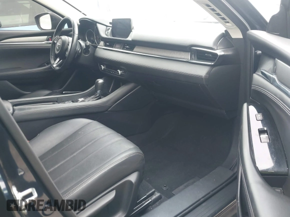 2018 Mazda 6 Grand Touring with VIN JM1GL1TY3J1334600, listed as a IAAI auction lot 41060893 with 64,852 mi miles and . Bid and sale history available at DreamBid. Image 5.
