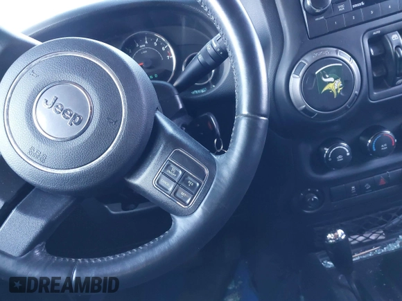 2018 Jeep Wrangler JK Unlimited Sport with VIN 1C4BJWDG2JL810424, listed as a IAAI auction lot 41610669 with 73,830 mi miles. Bid and sale history available at carsss.com. Image 11.