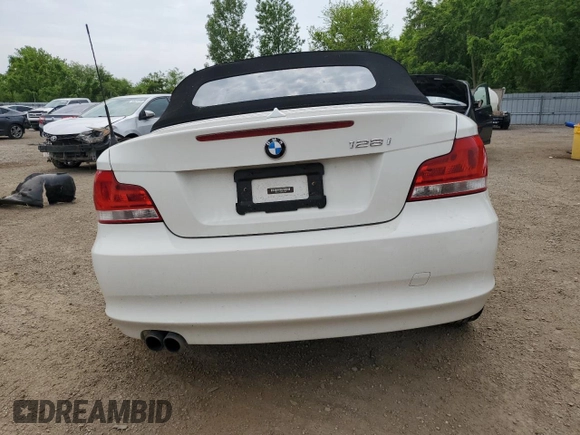 2012 BMW 1 Series 128i with VIN WBAUL7C52CVE87413, listed as a Copart auction lot 60557095 with 148,311 mi miles and Clean title. Bid and sale history available at DreamBid. Image 6.