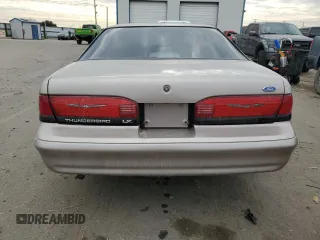 1994 Ford Thunderbird LX with VIN 1FALP6241RH110457, listed as a Copart auction lot 76384254 with 54,653 mi miles and Salvage Title. Bid and sale history available at DreamBid. Image 6.