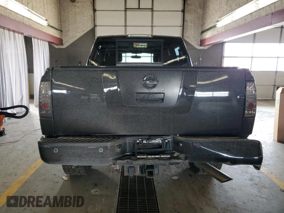 2011 Nissan Titan Pro-4X with VIN 1N6AA0EC5BN307980, listed as a Copart auction lot 42000295 with 168,335 mi miles and Salvage title. Bid and sale history available at DreamBid. Image 6.