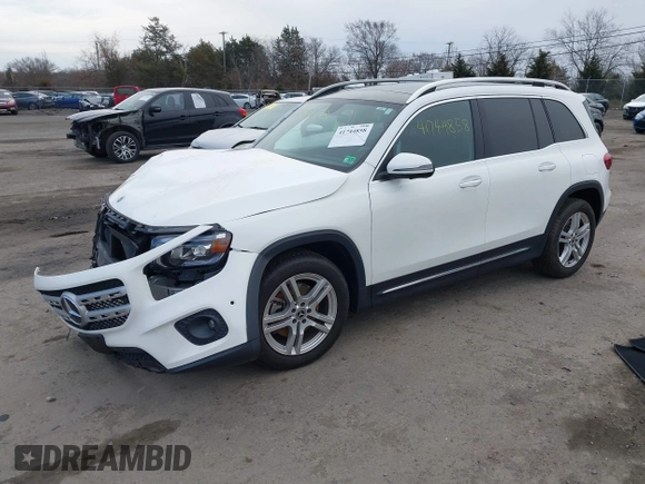 2022 Mercedes-Benz GLB 250 z VIN W1N4M4HB7NW173675, wystawiony jako IAAI lot #41744858 z przebiegiem 20 909 mil mil oraz . Historia ofert i sprzedaży dostępna na DreamBid. Obrazek 18.