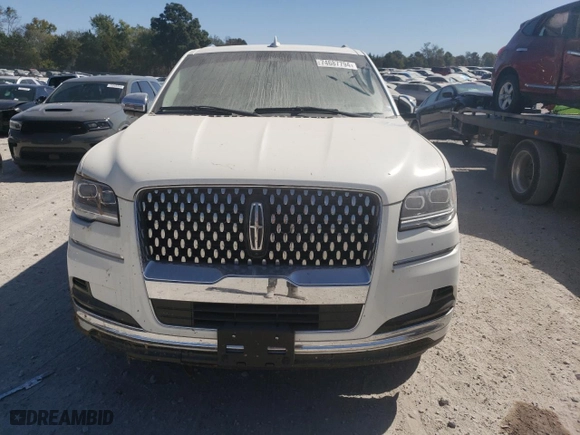 2022 Lincoln Navigator Black Label with VIN 5LMJJ2TT4NEL09900, listed as a Copart auction lot 74687794 with 0 mi miles and Salvage Title. Bid and sale history available at carsss.com. Image 5.