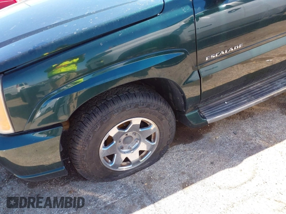 2003 Cadillac Escalade z VIN 1GYEK63N83R123971, wystawiony jako IAAI lot #41814808 z przebiegiem 235 724 mil mil oraz . Historia ofert i sprzedaży dostępna na DreamBid. Obrazek 6.