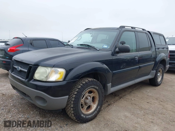 2003 Ford Explorer Sport Trac XLS z VIN 1FMZU77E43UB90738, wystawiony jako IAAI lot #41607465 z przebiegiem 223 708 mil mil oraz . Historia ofert i sprzedaży dostępna na DreamBid. Obrazek 2.