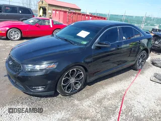 2013 Ford Taurus SHO z VIN 1FAHP2KT9DG164190, wystawiony jako IAAI lot #41743345 z przebiegiem 191 568 mil mil oraz . Historia ofert i sprzedaży dostępna na DreamBid. Obrazek 2.