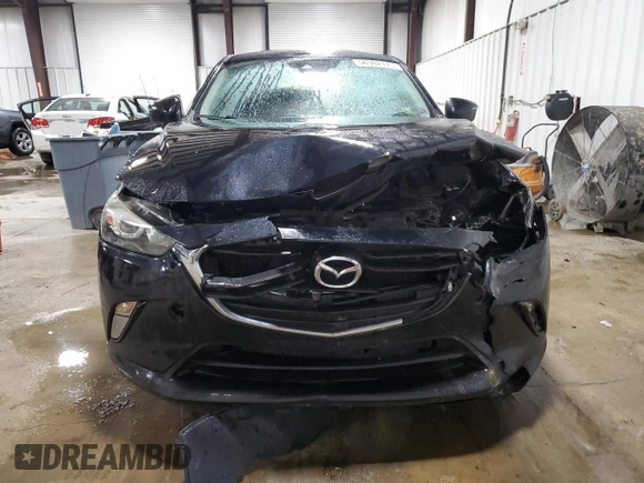 2018 Mazda CX-3 Touring z VIN JM1DKFC75J0301307, wystawiony jako Copart lot #56302175 z przebiegiem 107 676 mil mil oraz Szkoda całkowita • Salvage title. Historia ofert i sprzedaży dostępna na DreamBid. Obrazek 5.
