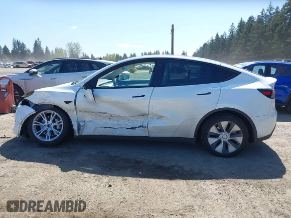 2022 Tesla Model Y Long Range z VIN 7SAYGDEE7NF418223, wystawiony jako IAAI lot #42046651 z przebiegiem 18 724 mil mil oraz . Historia ofert i sprzedaży dostępna na DreamBid. Obrazek 15.
