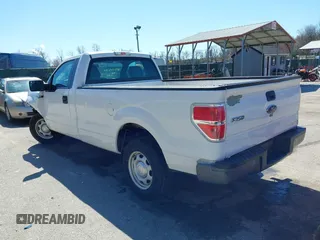 2014 Ford F-150 XL with VIN 1FTMF1CM1EKE41667, listed as a IAAI auction lot 41847599 with 31,671 mi miles and . Bid and sale history available at DreamBid. Image 3.