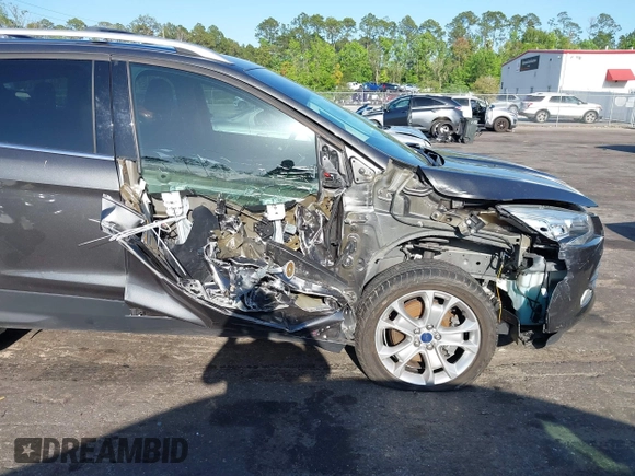 2016 Ford Escape Titanium with VIN 1FMCU9J94GUA63359, listed as a IAAI auction lot 41954514 with 94,315 mi miles. Bid and sale history available at carsss.com. Image 6.