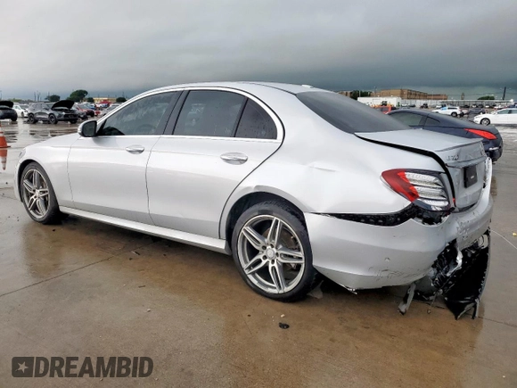 2017 Mercedes-Benz E 300 Luxury z VIN WDDZF4KB7HA057948, wystawiony jako Copart lot #55938655 z przebiegiem 97 828 mil mil oraz Szkoda całkowita • Salvage title. Historia ofert i sprzedaży dostępna na DreamBid. Obrazek 2.