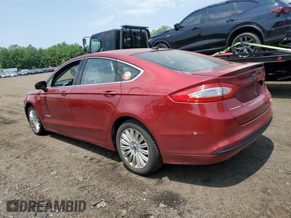 2013 Ford Fusion SE Hybrid z VIN 3FA6P0LUXDR335590, wystawiony jako Copart lot #60541395 z przebiegiem 121 975 mil mil oraz Szkoda całkowita • Salvage title. Historia ofert i sprzedaży dostępna na DreamBid. Obrazek 2.