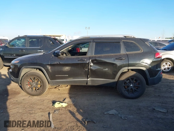 2015 Jeep Cherokee Latitude with VIN 1C4PJMCS0FW745949, listed as a IAAI auction lot 41289847 with 137,440 mi miles and . Bid and sale history available at carsss.com. Image 14.