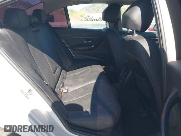 2014 BMW 3 Series 328d with VIN WBA3D3C5XEK156288, listed as a IAAI auction lot 42301663 with 84,416 mi miles and . Bid and sale history available at DreamBid. Image 8.
