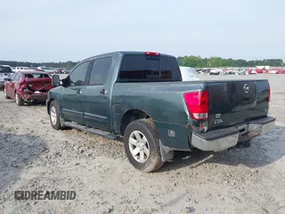 2004 Nissan Titan LE with VIN 1N6AA07A84N549757, listed as a IAAI auction lot 42083786 with 313,053 mi miles and . Bid and sale history available at DreamBid. Image 3.