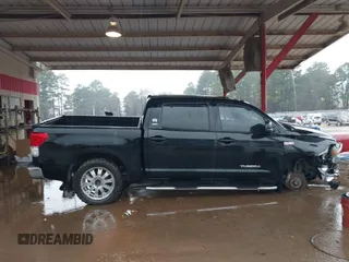 2012 Toyota Tundra 4WD Truck with VIN 5TFDW5F1XCX253223, listed as a IAAI auction lot 41453842 with 163,730 mi miles. Bid and sale history available at carsss.com. Image 14.