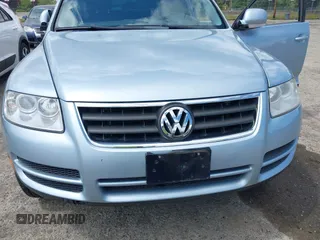 2007 Volkswagen Touareg V6 z VIN WVGZE77L37D001840, wystawiony jako IAAI lot #42323795 z przebiegiem 176 486 mil mil oraz . Historia ofert i sprzedaży dostępna na DreamBid. Obrazek 6.