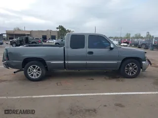 2002 GMC Sierra 1500 SLE with VIN 2GTEC19V121231109, listed as a IAAI auction lot 41906878 with 237,729 mi miles. Bid and sale history available at carsss.com. Image 13.