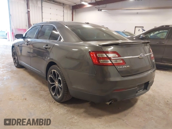 2015 Ford Taurus SHO with VIN 1FAHP2KT2FG148691, listed as a IAAI auction lot 42033867 with 94,840 mi miles and . Bid and sale history available at DreamBid. Image 3.