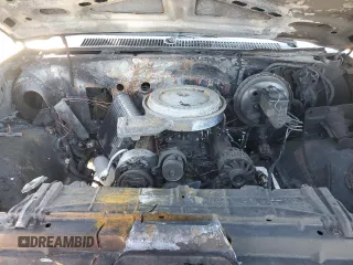 1989 Chevrolet Suburban z VIN 1GNGV26K8KF128711, wystawiony jako Copart lot #46658895 z przebiegiem Nie podano mil oraz Szkoda całkowita • Salvage title. Historia ofert i sprzedaży dostępna na DreamBid. Obrazek 13.
