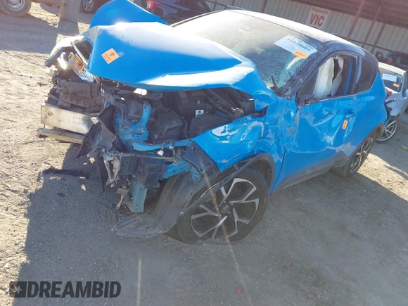 2019 Toyota C-HR XLE with VIN JTNKHMBX9K1056627, listed as a IAAI auction lot 41030089 with 1 mi miles. Bid and sale history available at carsss.com. Image 16.