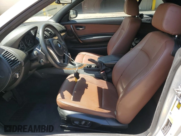 2012 BMW 1 Series 128i with VIN WBAUN1C50CVR00384, listed as a Copart auction lot 53232185 with 79,189 mi miles and Salvage title. Bid and sale history available at DreamBid. Image 7.