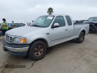 2000 Ford F-150 XL with VIN 1FTRX17W0YKA70861, listed as a IAAI auction lot 42096438 with 1 mi miles. Bid and sale history available at carsss.com. Image 14.
