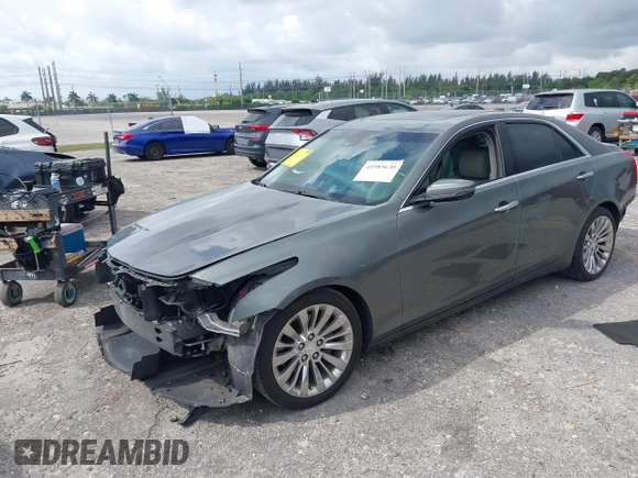 2016 Cadillac CTS Luxury Collection RWD with VIN 1G6AR5SXXG0108544, listed as a IAAI auction lot 41985630 with 86,014 mi miles and . Bid and sale history available at DreamBid. Image 18.