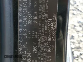 2005 Kia Spectra with VIN KNAFE161655093051, listed as a Copart auction lot 77821904 with 104,874 mi miles and Salvage Title. Bid and sale history available at carsss.com. Image 14.