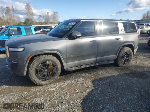 2022 Rivian R1S Launch Edition with VIN 7PDSGABL1NN000514, listed as a Copart auction lot 77444184 with 29,490 mi miles and Salvage Title. Bid and sale history available at DreamBid. Image 1.