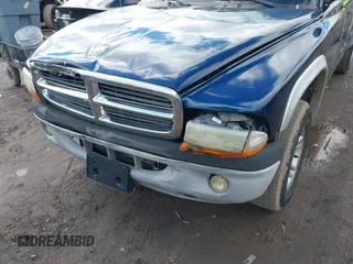 2004 Dodge Dakota SLT with VIN 1D7HG42N44S519910, listed as a IAAI auction lot 41737881 with 154,008 mi miles. Bid and sale history available at carsss.com. Image 6.