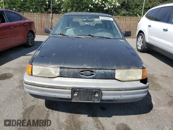 1992 Ford Escort z VIN 1FAPP11JXNW156984, wystawiony jako Copart lot #63462264 z przebiegiem 37 774 mil mil oraz Szkoda całkowita • Salvage title. Historia ofert i sprzedaży dostępna na DreamBid. Obrazek 5.