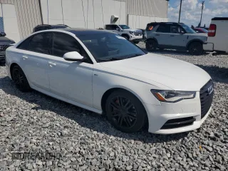 2016 Audi A6 Premium with VIN WAUFFAFCXGN186074, listed as a Copart auction lot 56920015 with 124,382 mi miles and Salvage title. Bid and sale history available at DreamBid. Image 4.