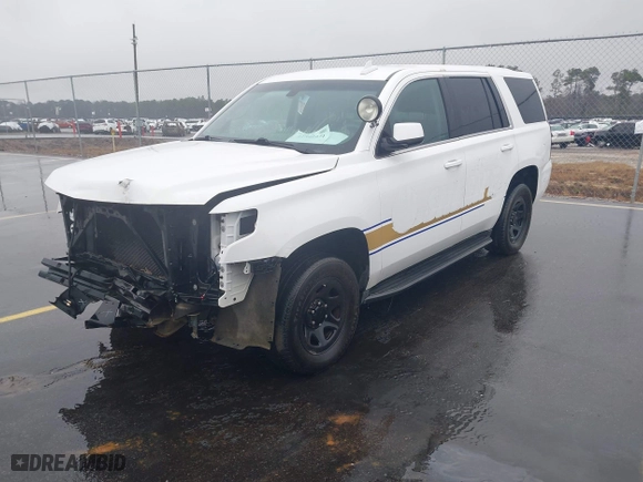 2019 Chevrolet Tahoe Commercial with VIN 1GNLCDEC4KR198330, listed as a IAAI auction lot 41542971 with 94,171 mi miles. Bid and sale history available at carsss.com. Image 2.