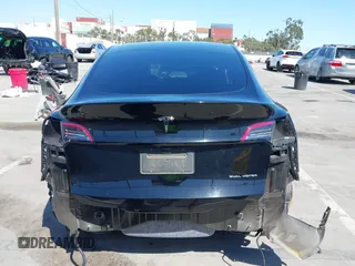 2022 Tesla Model Y Long Range with VIN 7SAYGDEE6NF480471, listed as a IAAI auction lot 41985797 with 82,777 mi miles and . Bid and sale history available at DreamBid. Image 6.