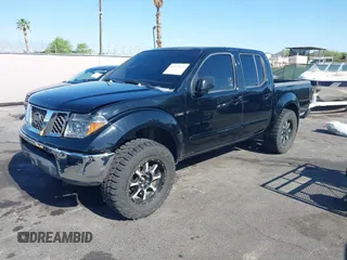 2006 Nissan Frontier SE z VIN 1N6AD07WX6C458569, wystawiony jako IAAI lot #42317531 z przebiegiem 198 485 mil mil oraz . Historia ofert i sprzedaży dostępna na DreamBid. Obrazek 2.