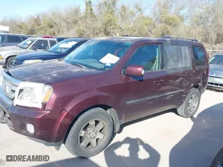 2011 Honda Pilot Touring with VIN 5FNYF4H91BB019009, listed as a IAAI auction lot 41827297 with 170,070 mi miles. Bid and sale history available at carsss.com. Image 2.