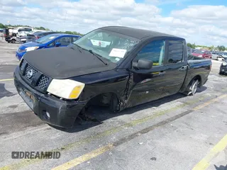 2005 Nissan Titan SE with VIN 1N6AA07A05N501283, listed as a IAAI auction lot 39151799 with 129,069 mi miles and . Bid and sale history available at DreamBid. Image 2.