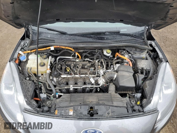 2021 Ford Escape SE Hybrid with VIN 1FMCU9BZ3MUA68658, listed as a Copart auction lot 55977435 with 149,167 mi miles and Salvage title. Bid and sale history available at DreamBid. Image 12.