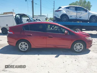 2010 Honda Insight EX with VIN JHMZE2H71AS021062, listed as a IAAI auction lot 41857350 with 45,558 mi miles and . Bid and sale history available at carsss.com. Image 14.