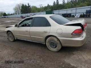 2001 Honda Accord LX z VIN 1HGCG56471A806768, wystawiony jako Copart lot #57066765 z przebiegiem 166 743 mil mil oraz Czysty tytuł • Clean title. Historia ofert i sprzedaży dostępna na DreamBid. Obrazek 2.
