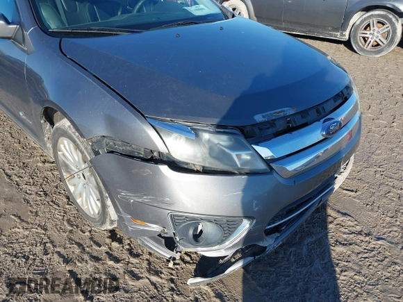 2010 Ford Fusion Hybrid with VIN 3FADP0L39AR125251, listed as a IAAI auction lot 41100606 with 235,612 mi miles. Bid and sale history available at carsss.com. Image 6.